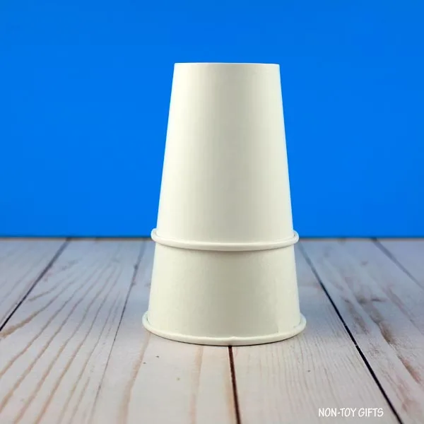 two paper cups placed together
