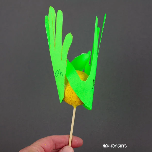green handprint shapes
