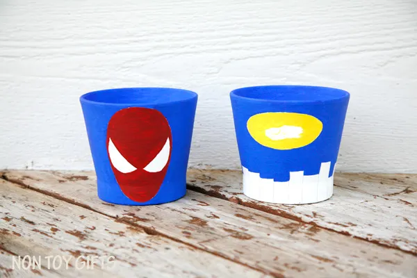 Superhero grass pots - fun craft for kids