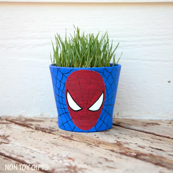 Superhero grass pots - fun craft for kids
