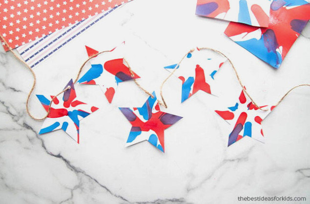 Cut stars out of salad spinner art