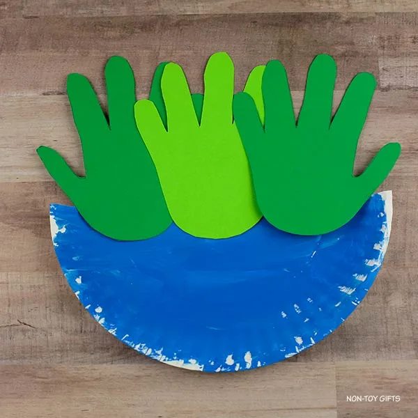 handprints made from green paper