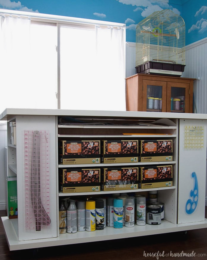 Rather than tossing out inexpensive bookcases from your college years, repurpose them into an ideal workstation. Make this impressive rolling worktable from an upcycled bookcase for your craft room or office. | Housefulofhandmade.com || Craft Table | Rolling Work Table | Repurposed Bookcase | Craft Room Storage | Free Building Plans