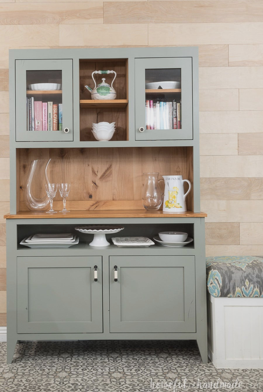 Beautiful gray dining room hutch with natural knotty wood on the interior. Plenty of storage and display room.