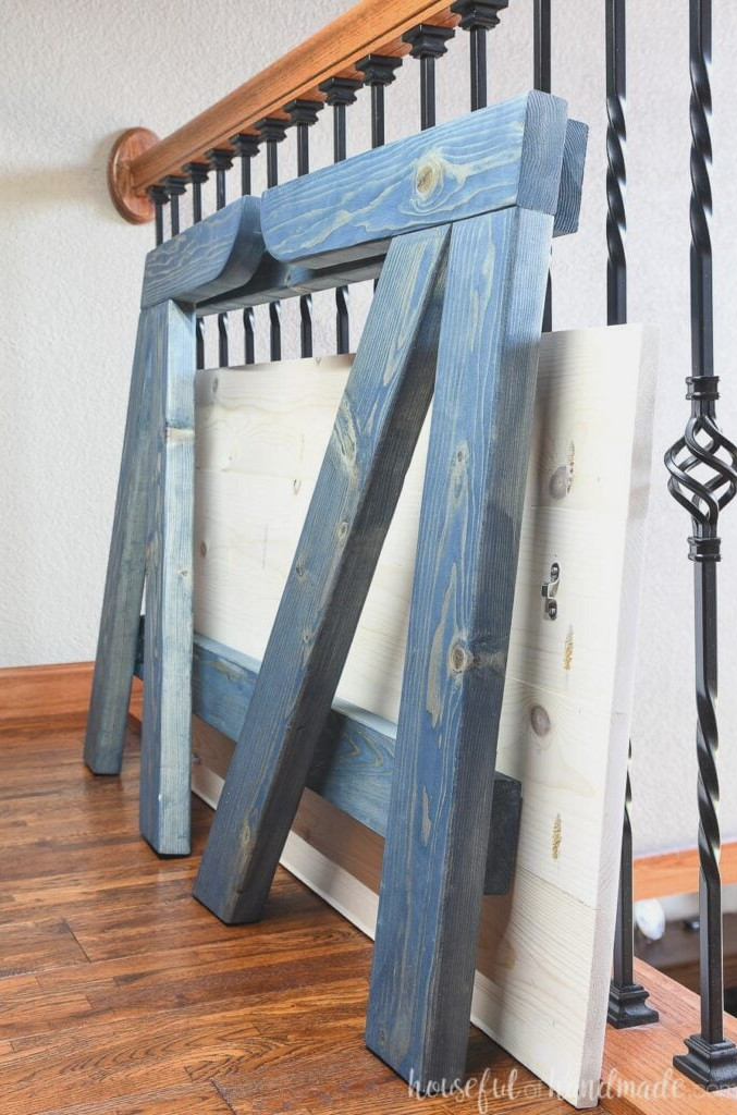 The folding desk collapsed and prepared to be stored away.