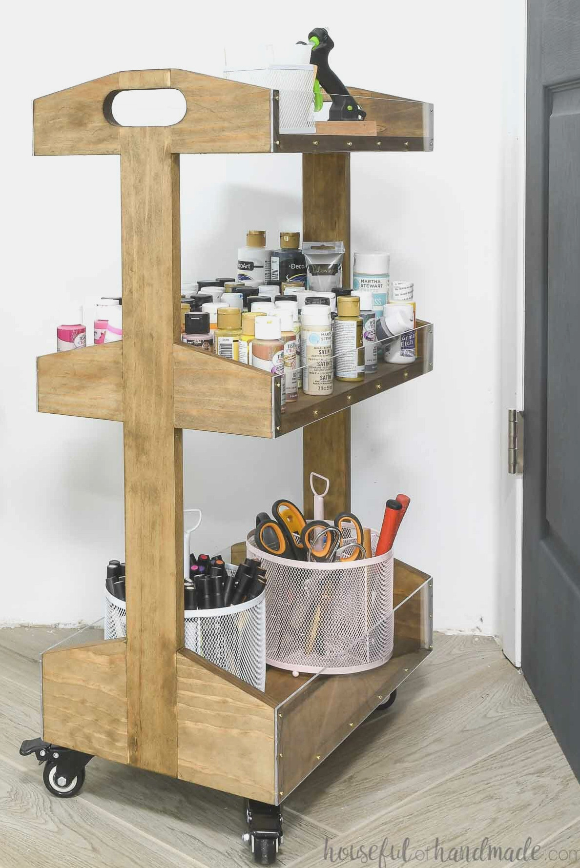 View of the DIY wooden rolling cart sides showing a center post rather than corner posts.