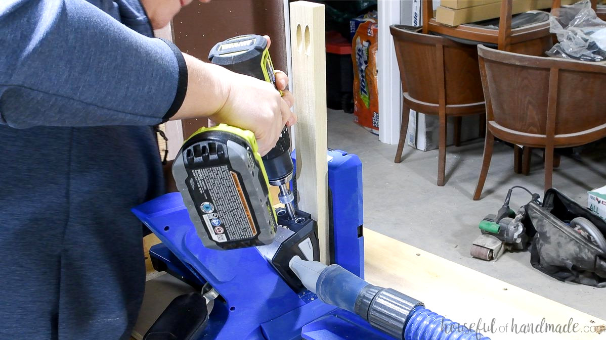 Using the Kreg pocket hole jig to drill holes in the ends of the face frame rails.