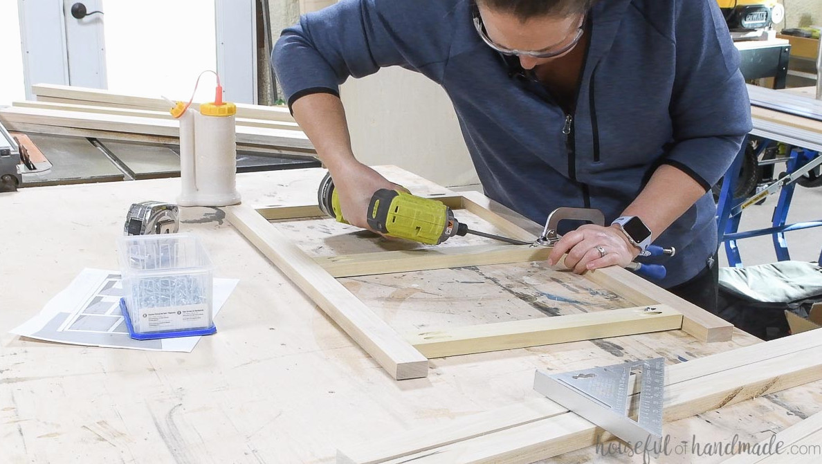 Fastening the rails between the stiles of the desk cabinet face frame.