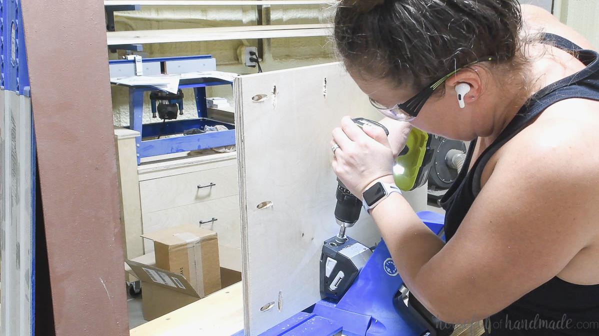 Adding pocket holes to 3 sides of the plywood desk cabinet bottom panel.