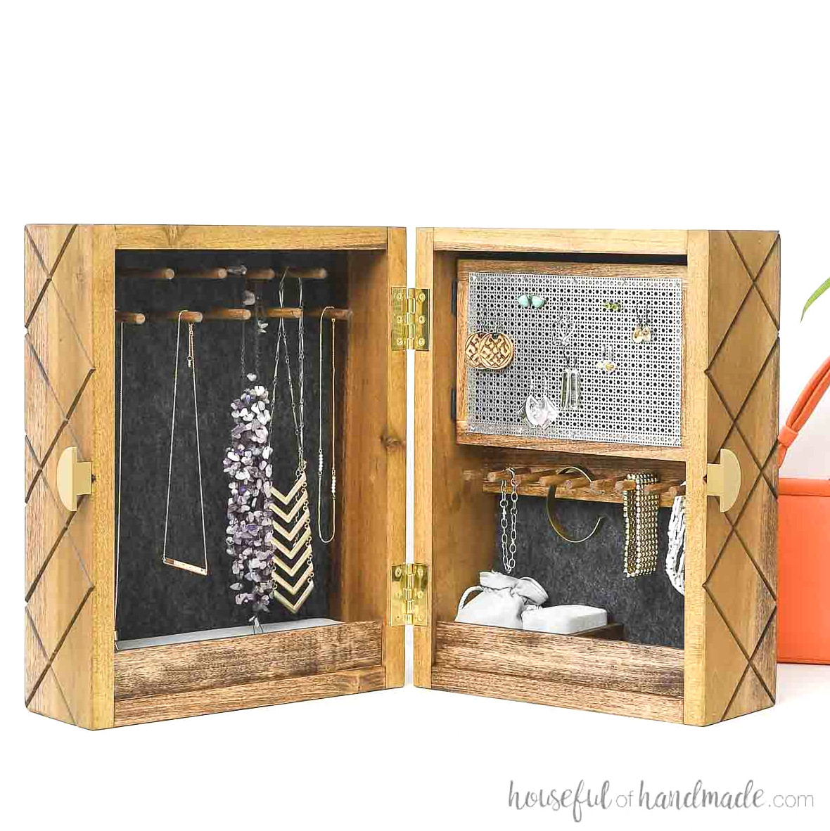 DIY jewelry box featuring pegs for necklaces and bracelets, compartments for earrings, and containers for small pieces.