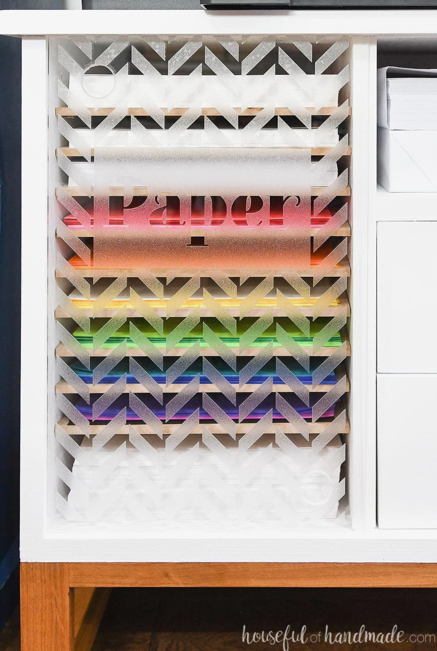 Plexiglass door on the printer stand adorned with frosted vinyl.
