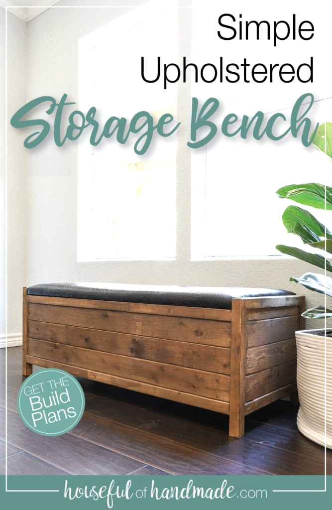 Wooden storage bench with a black padded top positioned before a window with text overlay.