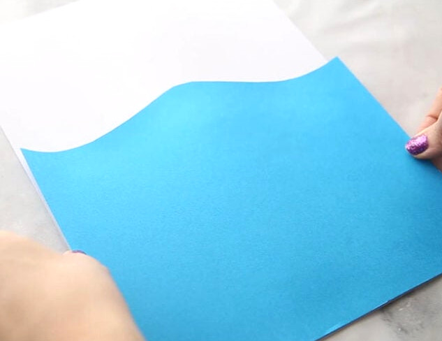 Glue on blue cardstock