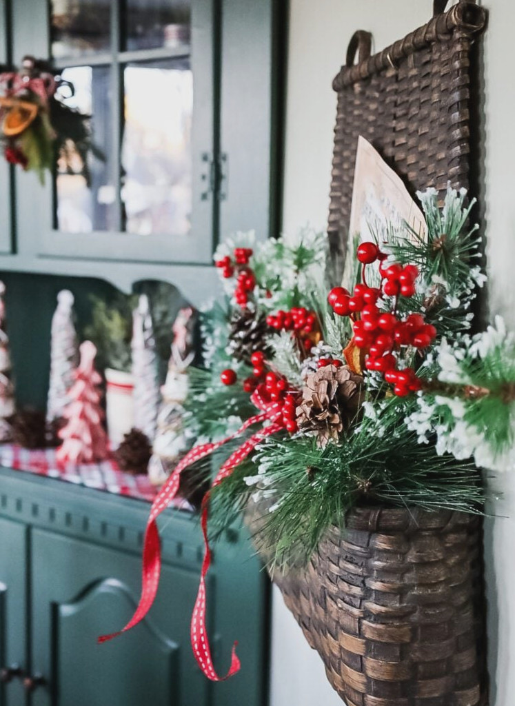 green hutch and wall basket with berries