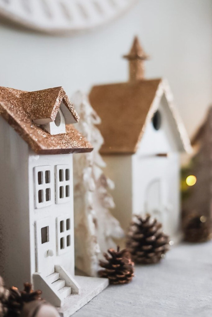 a gold and white Christmas village