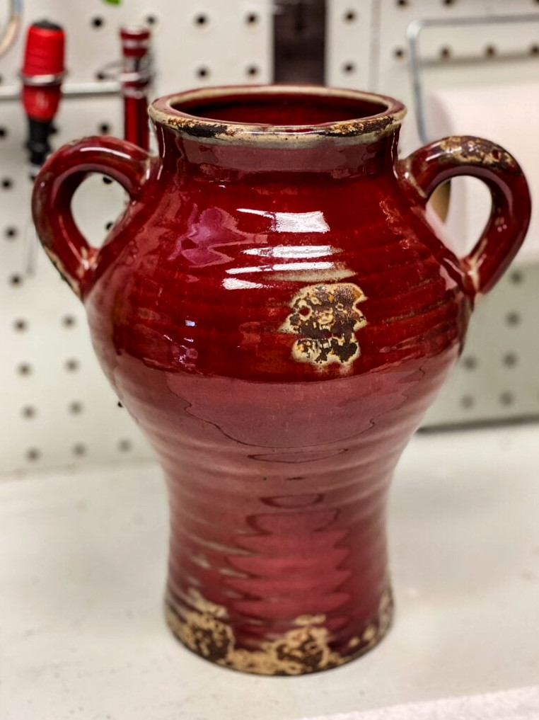 red ceramic jug