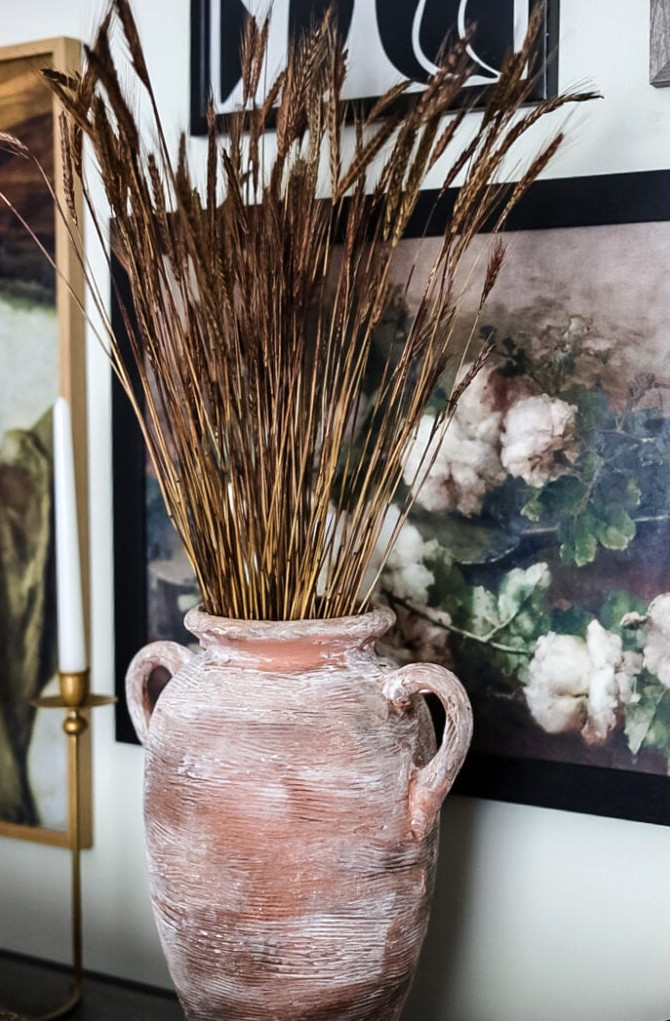 vase filled with dried grass