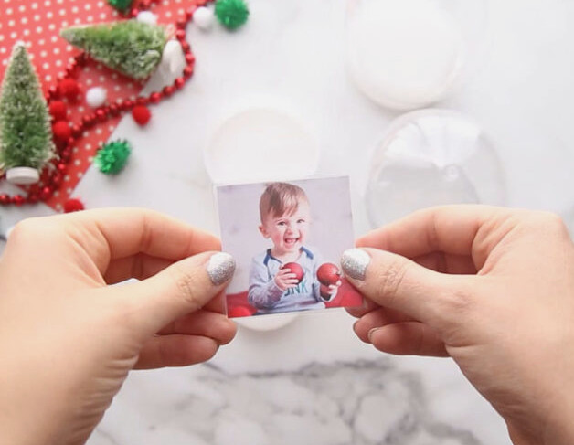 Laminate a photo for a homemade snow globe