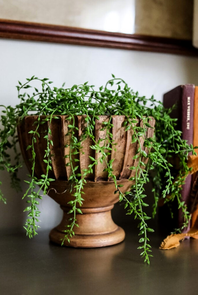 urn with faux succulent