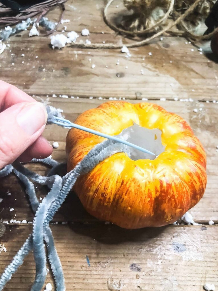 covering pumpkin with yarn