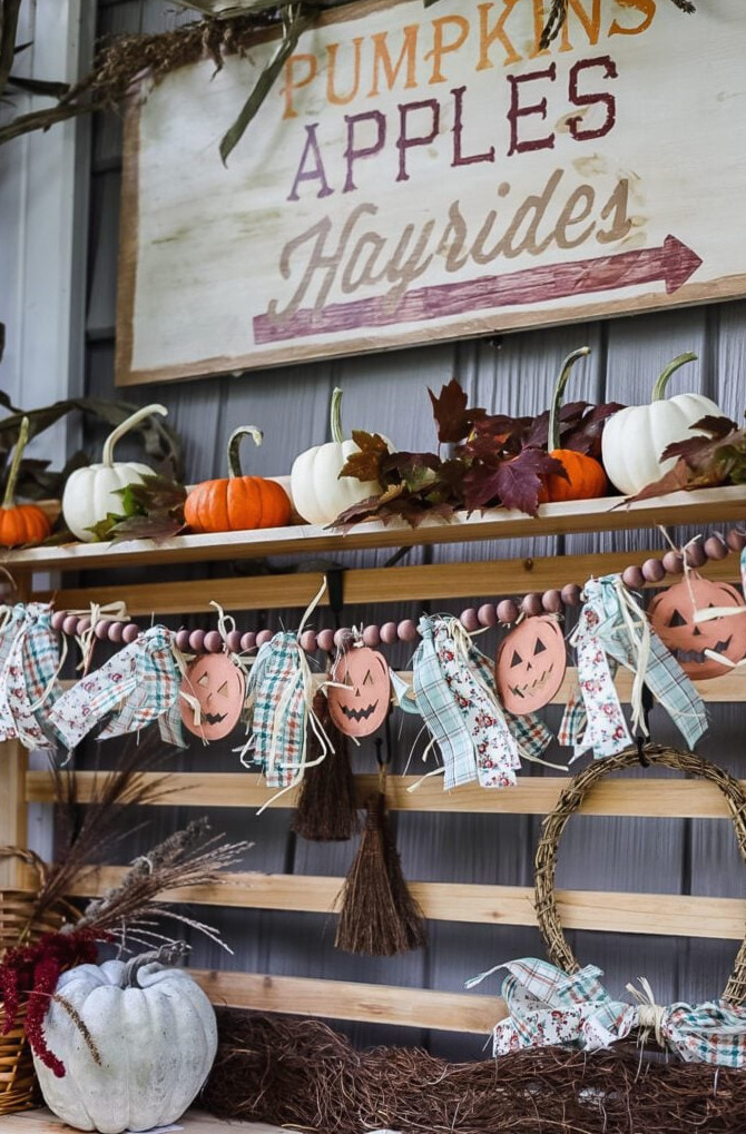 pumpkin garland on front porch