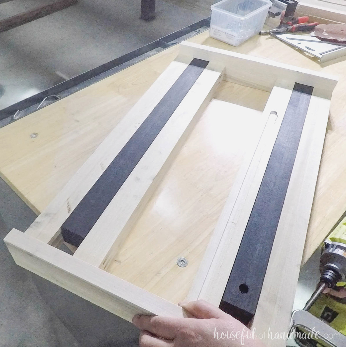 Inserting leaf support and adding the remaining boards to close it in. 