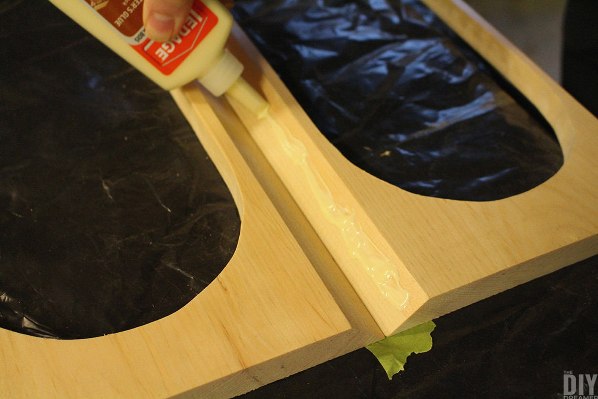 Spreading glue along the edges.