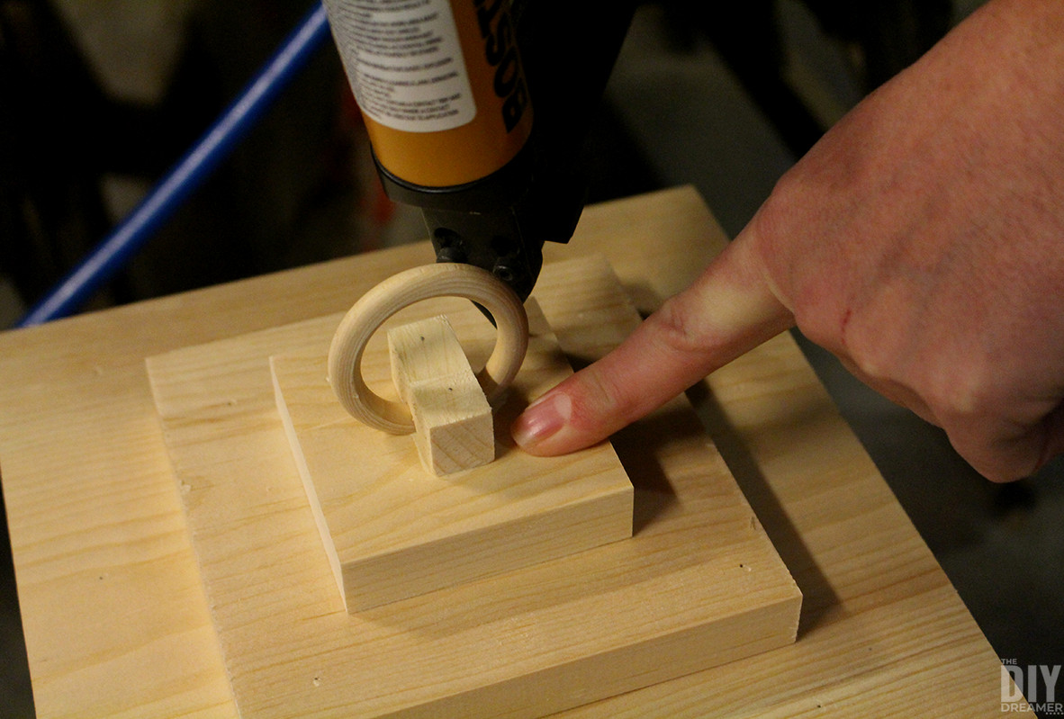 Attaching third piece onto the second top piece.