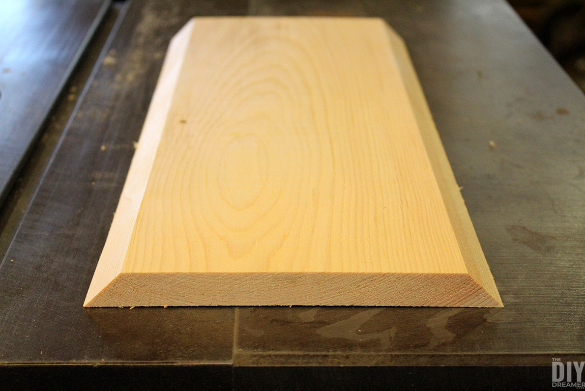 Board with 45 degree edges on two long sides.