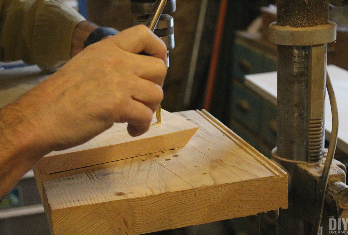 Drilling holes in corner of the template.