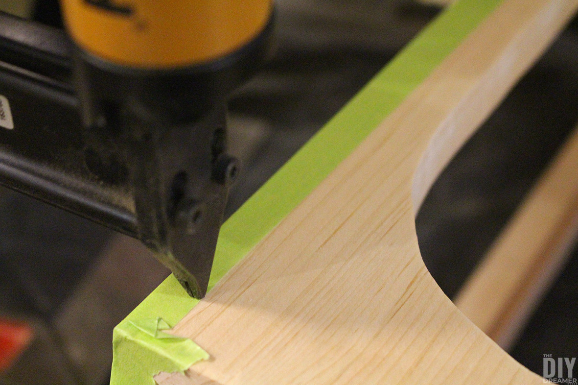 Fastening the edges with nails.