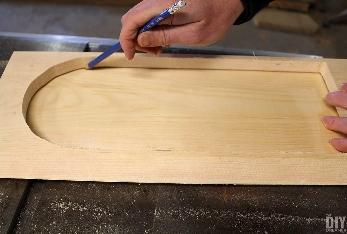Tracing template onto another piece of wood.