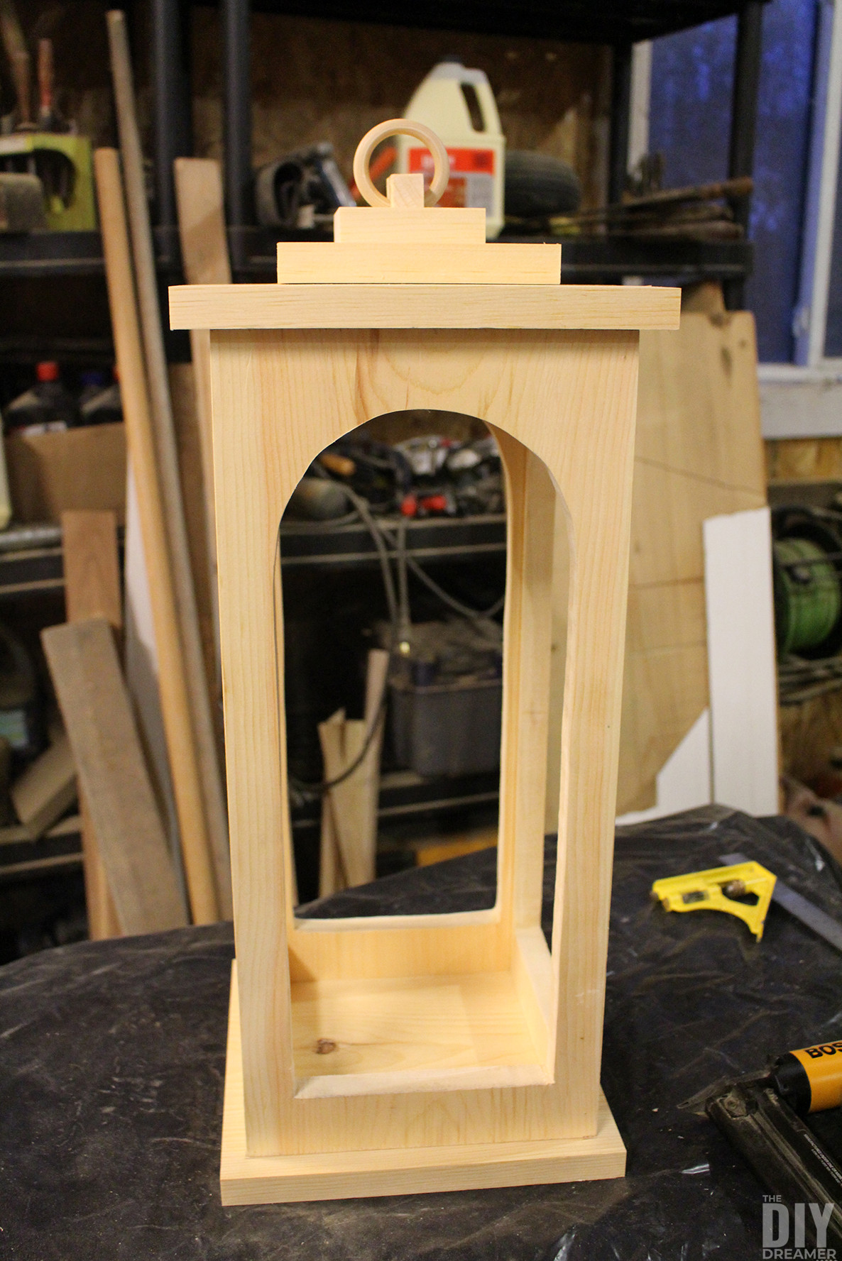 Wood lantern in workshop.