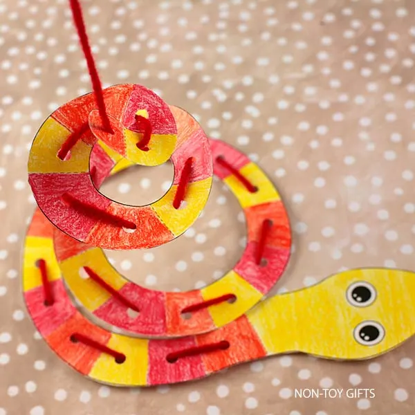 weave yarn through the holes