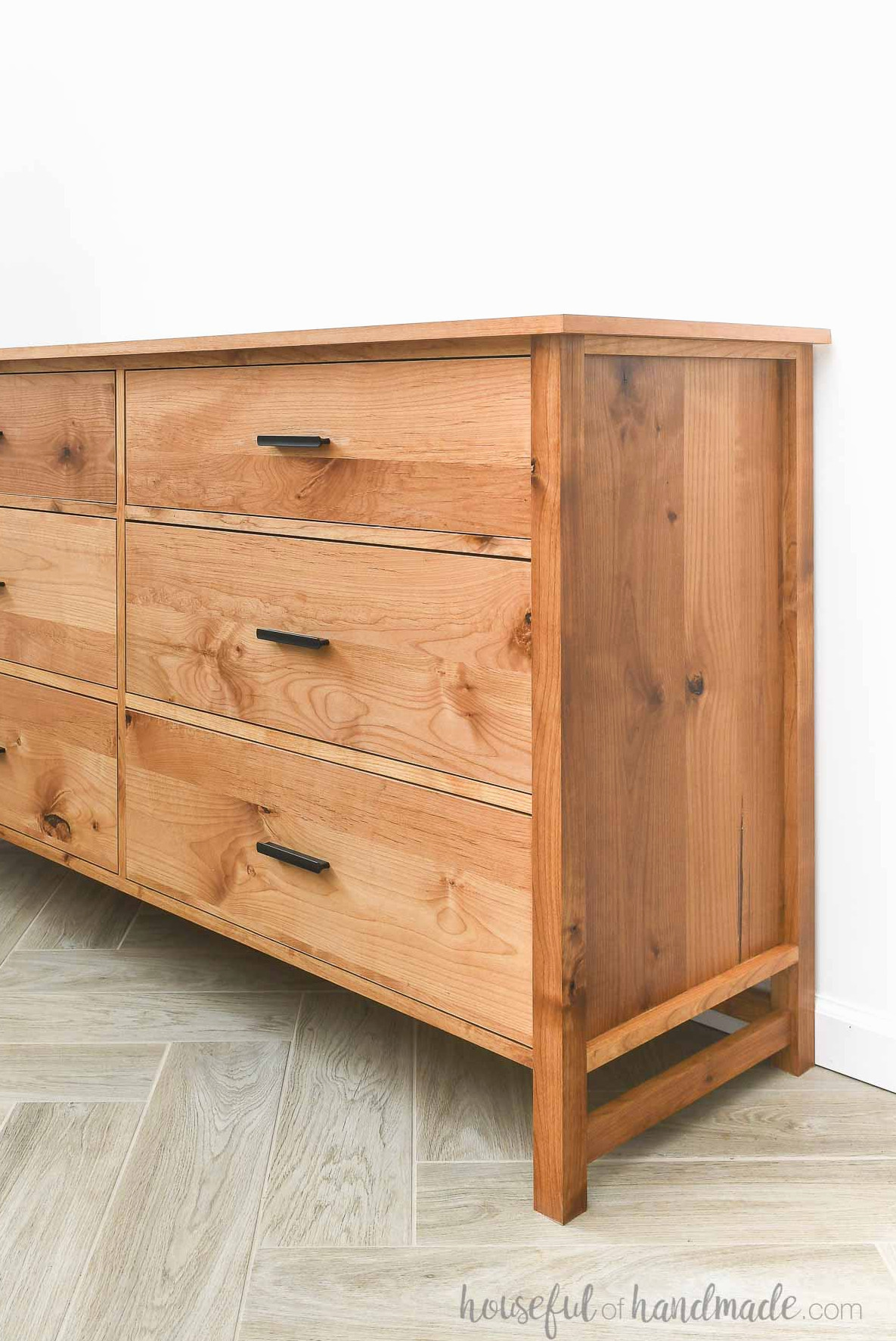 Close-up view of the side of the large DIY alder dresser.