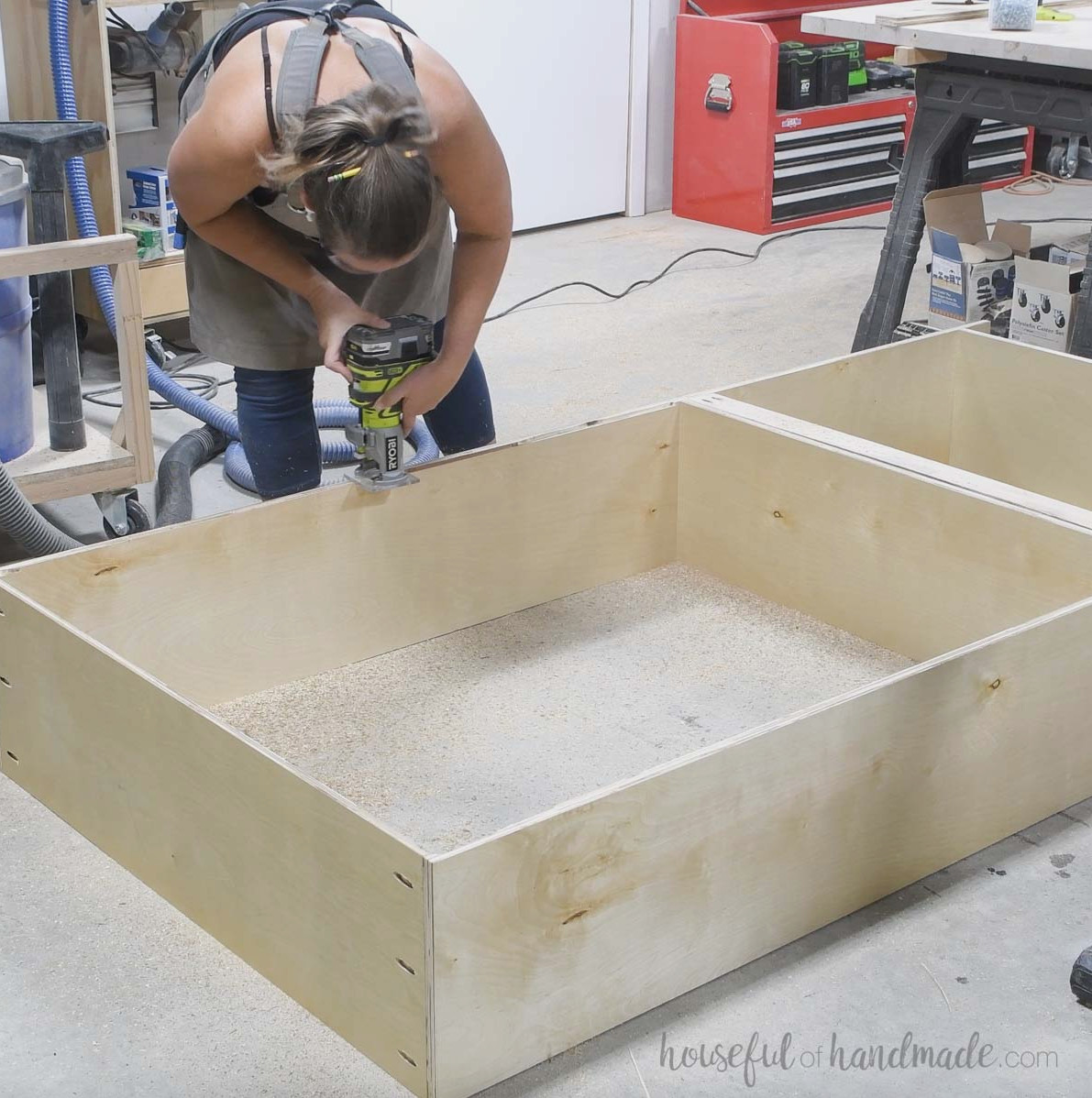 Cutting a channel into the back of the bookcase.
