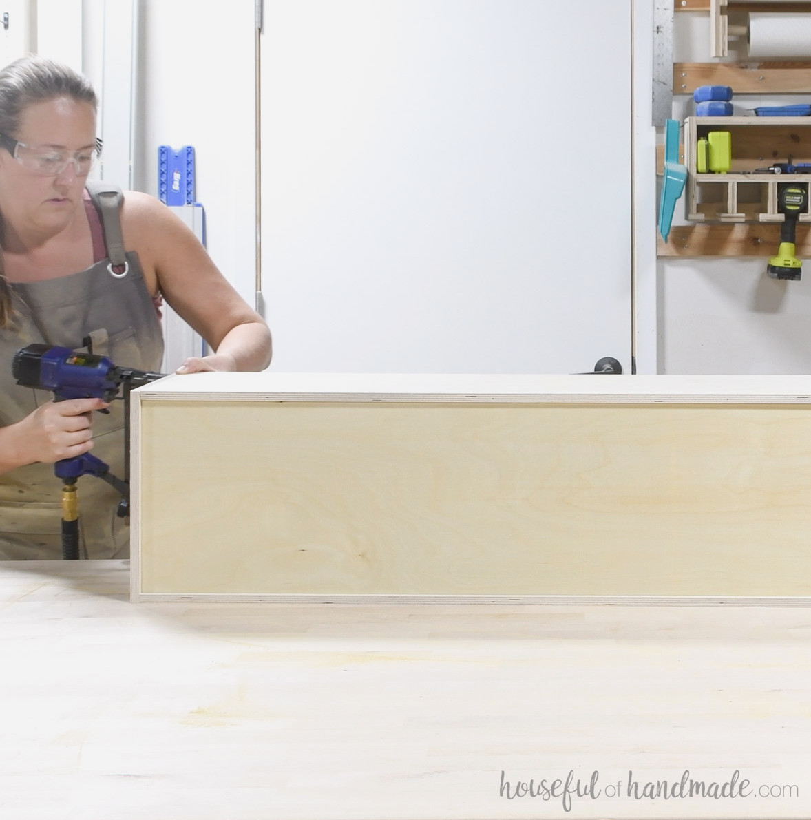 Building a drawer box with pneumatic staples. 