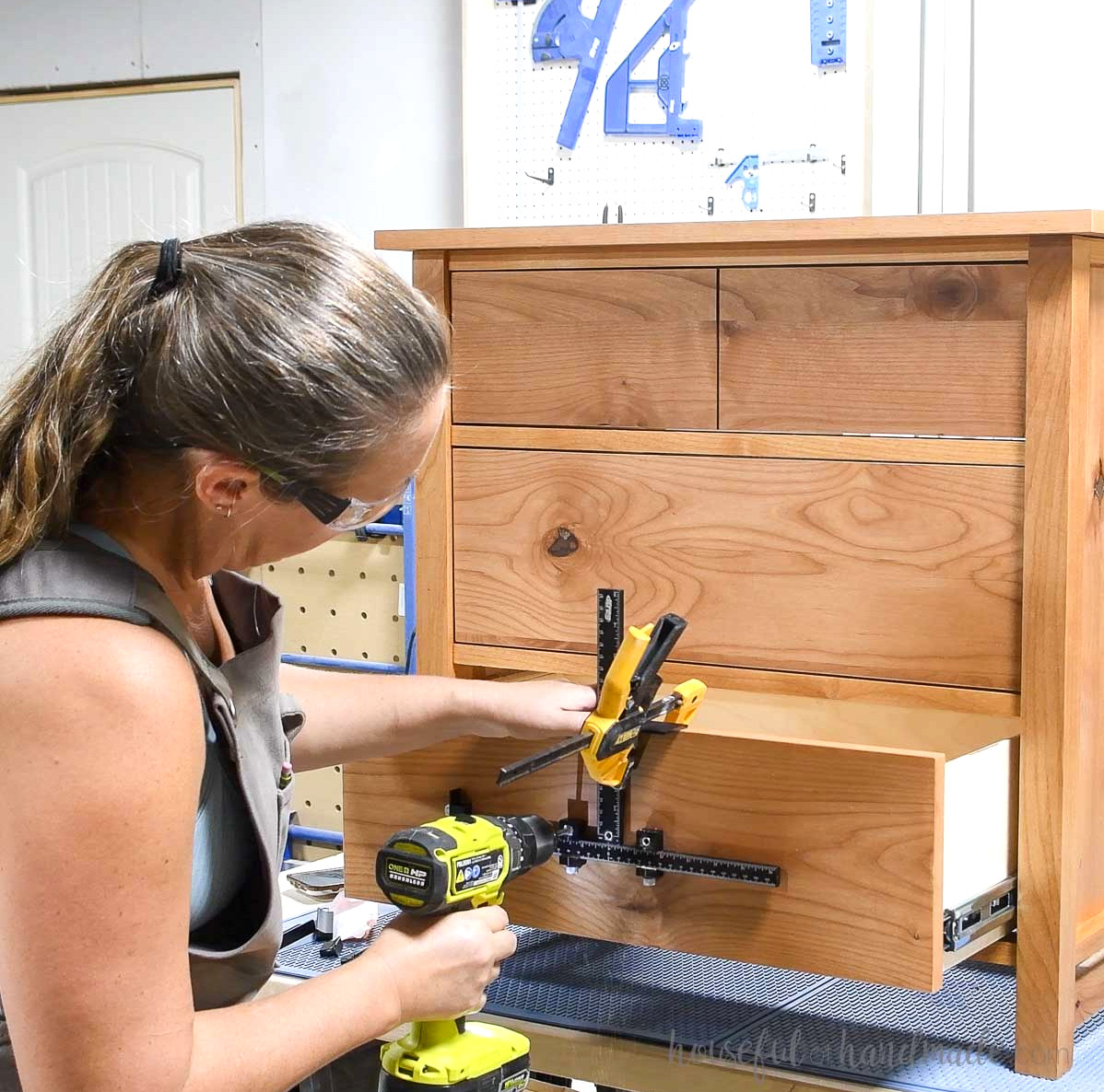 Using the Kreg Cabinet hardware jig to install drawer pulls on the nightstand drawers.