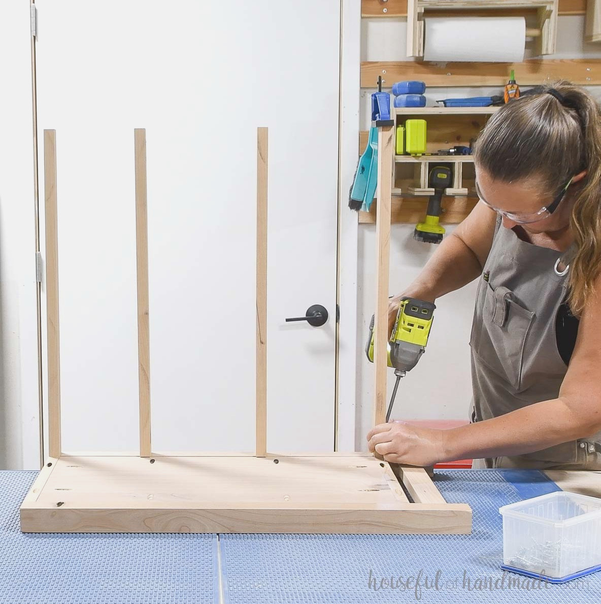Securing the front trim pieces to one side with pocket holes.