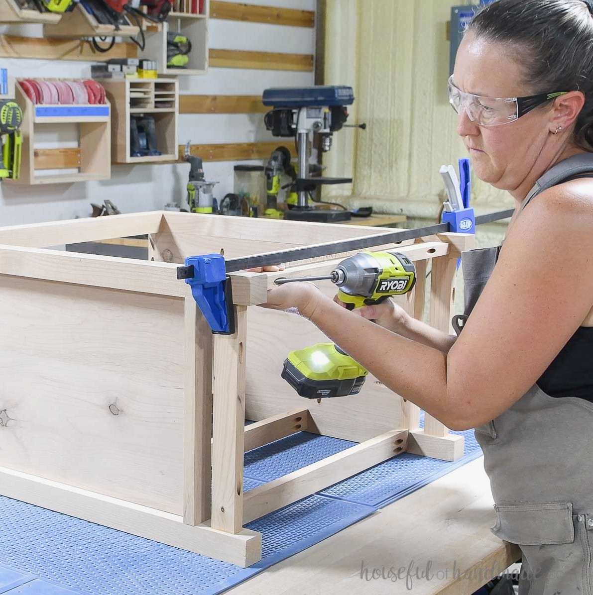 Securing the back pieces to the nightstand.