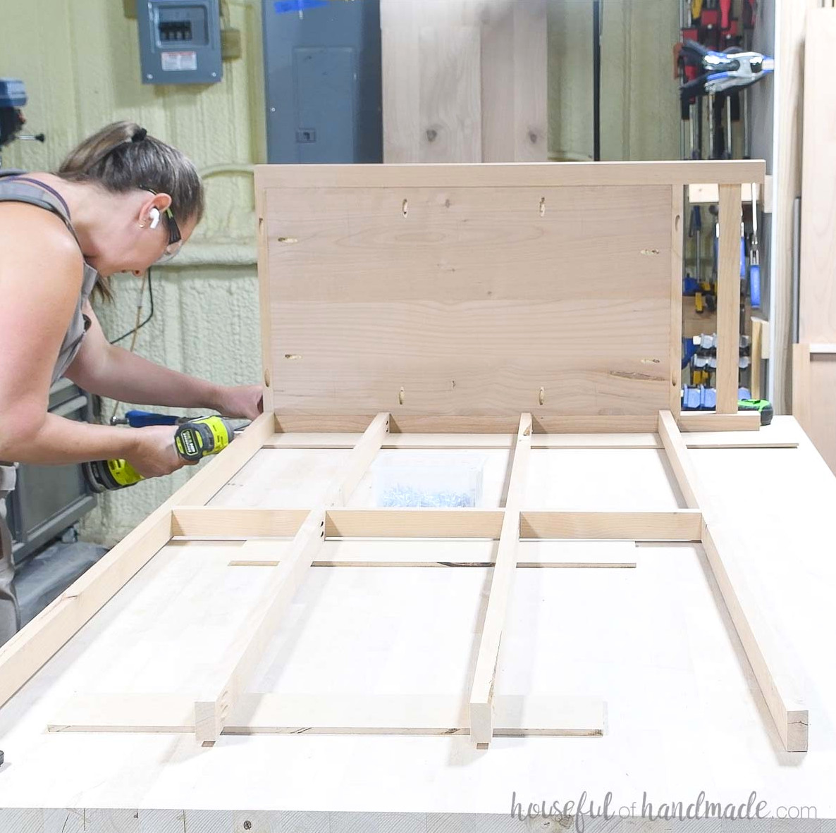 Securing the front frame between the sides.