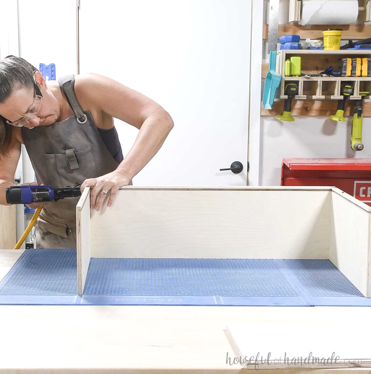Attaching the drawer box sides to the drawer box front piece.