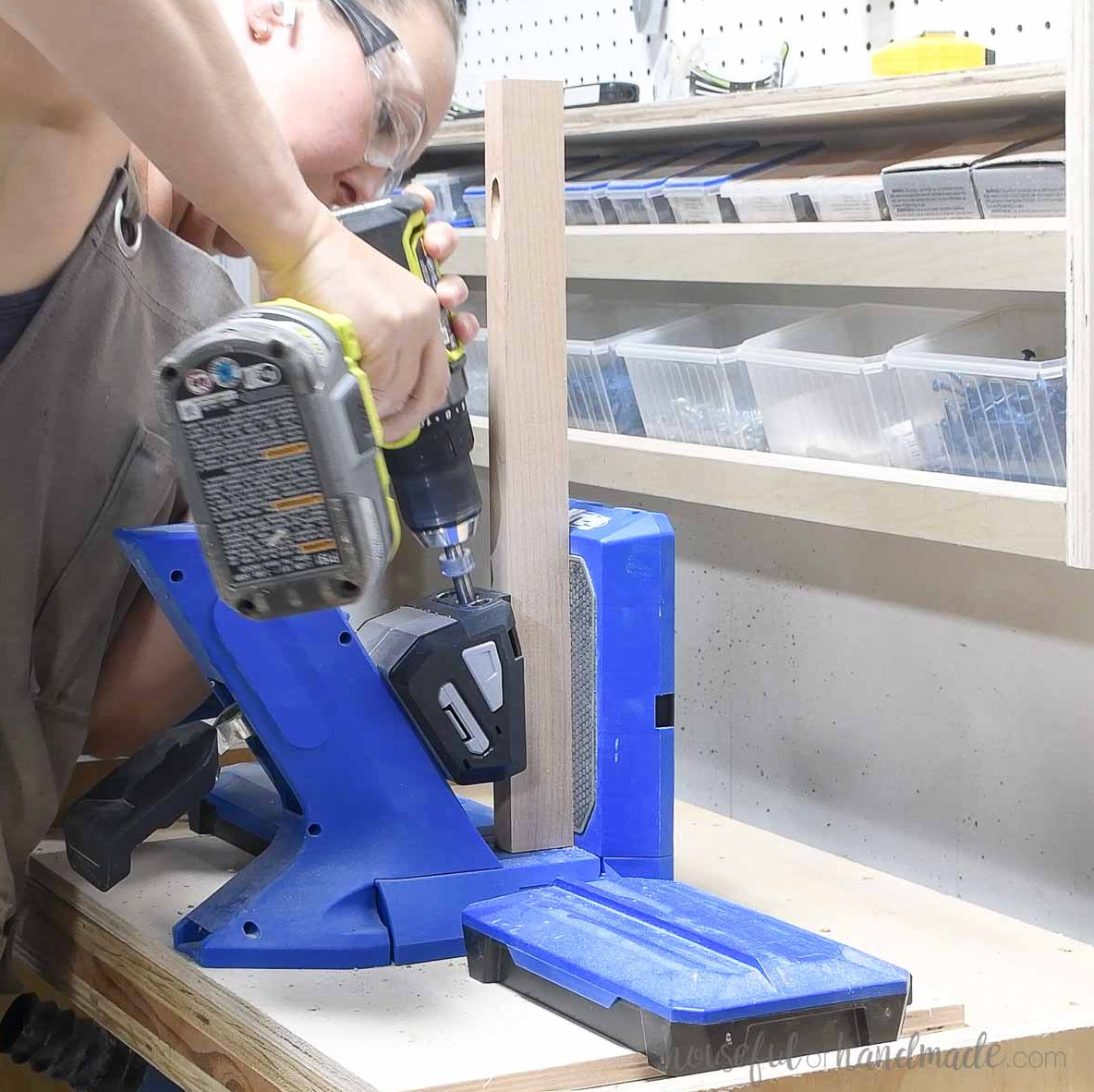 Drilling a pocket hole on the short side of the 1x2 board.