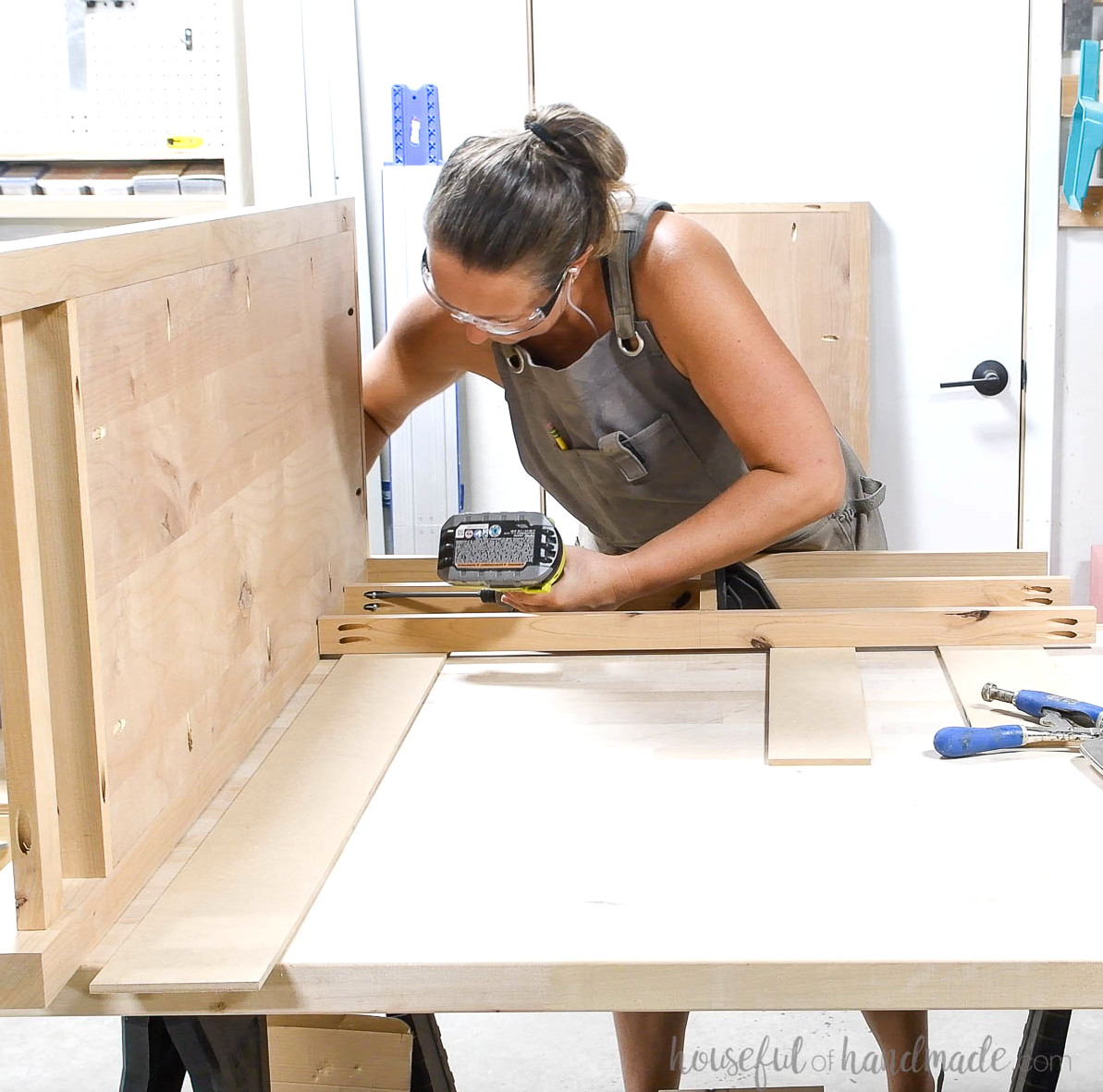 Attaching the front frame to the dresser side. 