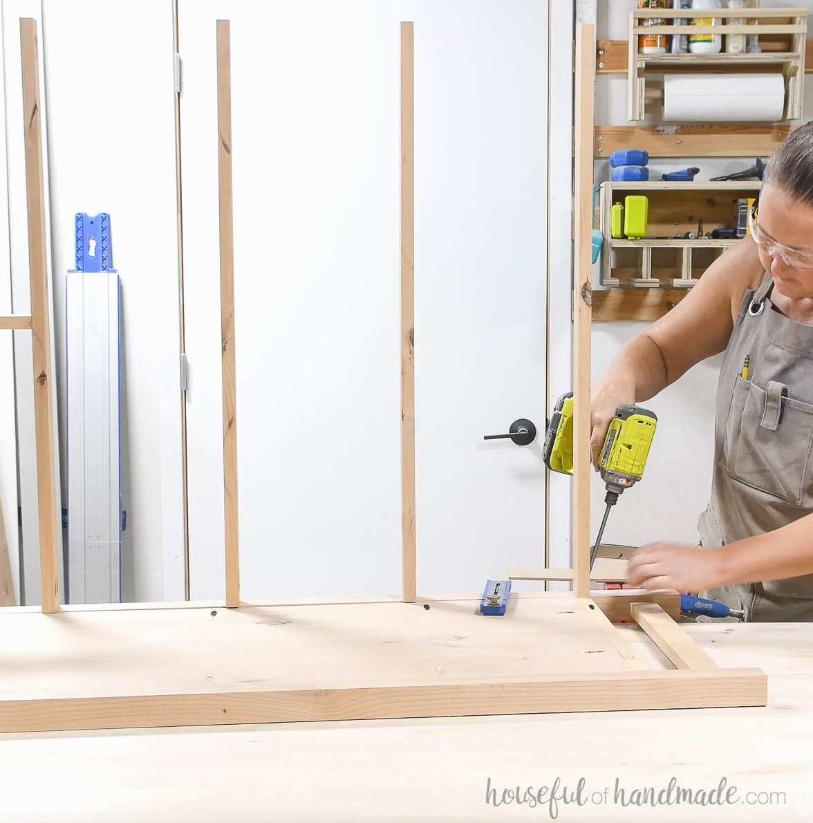 Attaching the remaining front face pieces to divide the lower drawer area.
