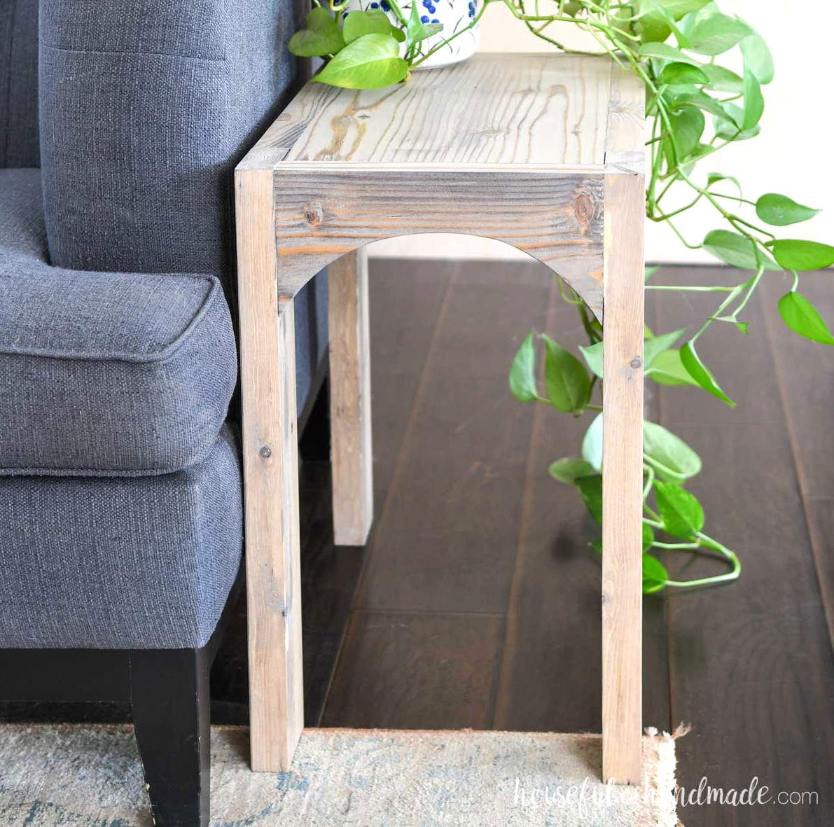 Chunky side table featuring one top shelf with open space underneath. 