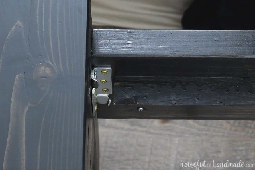 Close up picture of the bed rails attached with the bed rail brackets.