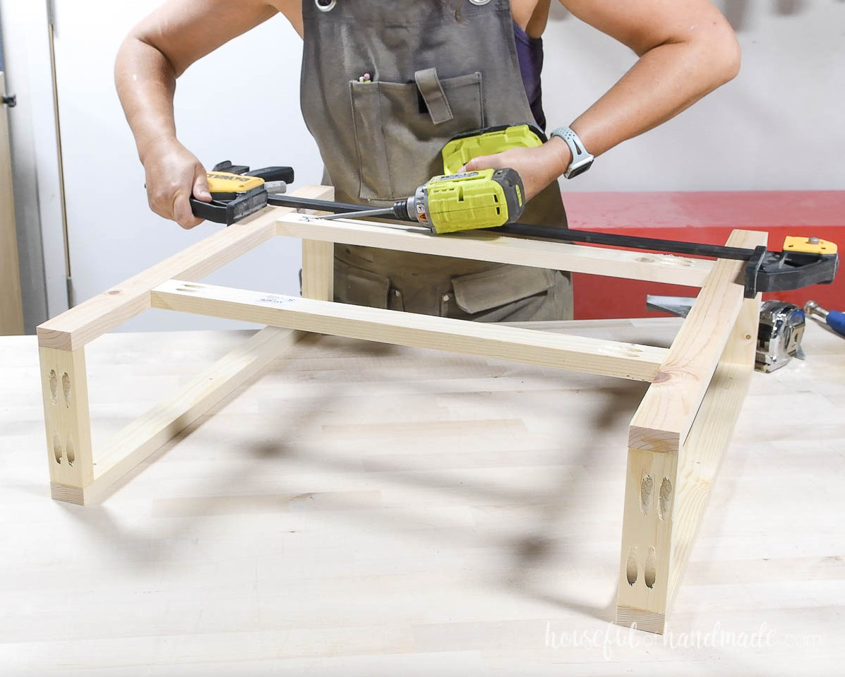 Connecting the back piece to the second side using pocket holes.