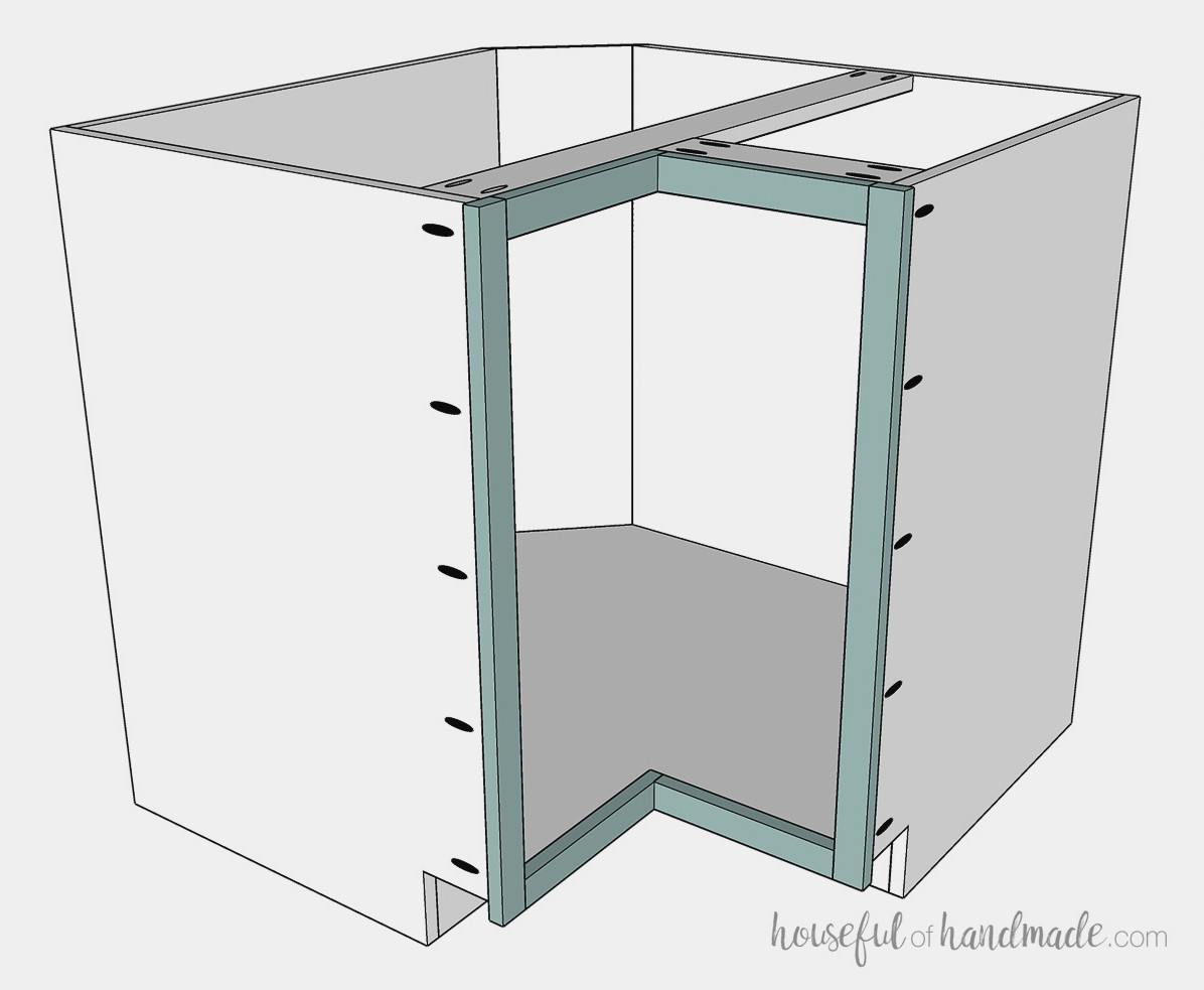 Securing the face frame to the corner cabinet box.