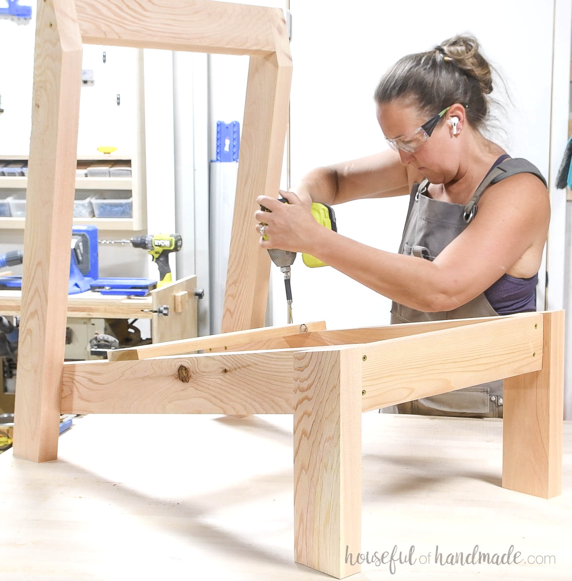 Securing the slat support piece to the chair base.